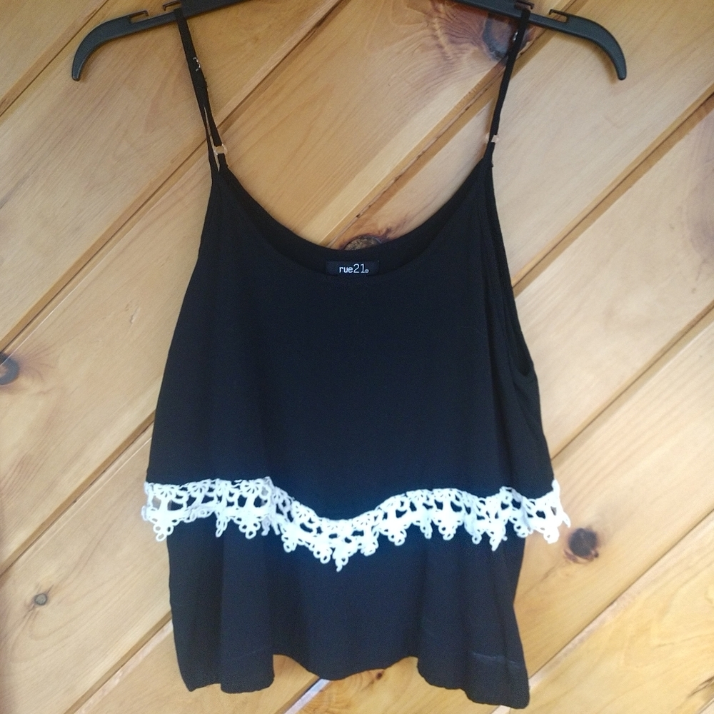 Black tank top with lace detailing.